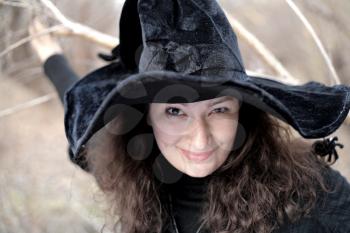 lady in black witch hat headshot closeup