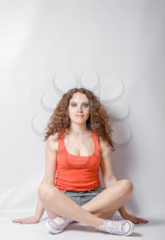  young woman do yoga meditation on white background her eyes open