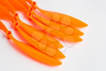 Propeller set of orange color on white