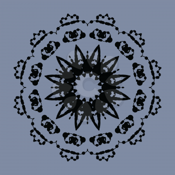 Symmetrical mandala of ink splashes on gray background.