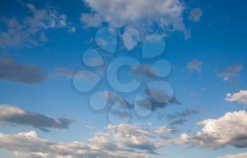 Clouds frame copyspace. Beautiful sparse clouds in the blue sky