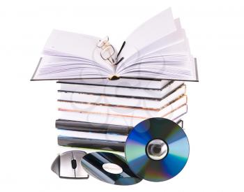 stack of books with pen glasses and a computer mouse