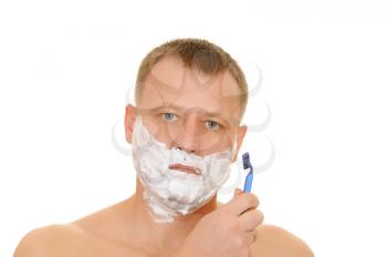 Royalty Free Photo of a Man Shaving