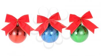 three christmas decorations with red bow  isolated on white background