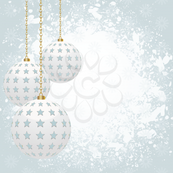 Christmas background with white baubles in front of grunge area for message on a blue background with snow flakes