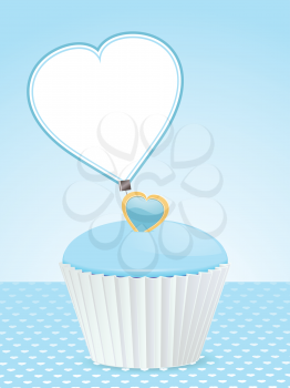 cupcake with blue icing and heart shaped message label