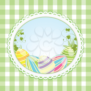 Easter eggs in a white border on a green gingham background