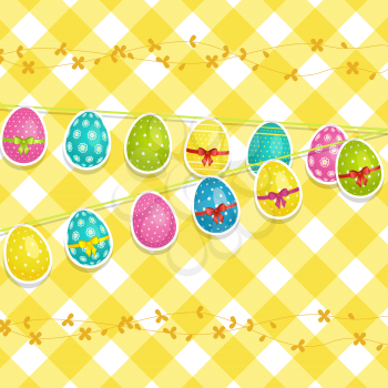 Easter background with decorated eggs hanging from string on a yellow gingham