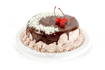 cake closeup with cherry isolated on a white