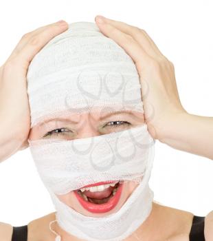 Royalty Free Photo of a Woman With Bandages on Her Face