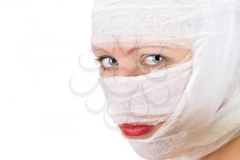 Royalty Free Photo of a Woman With Bandages on Her Face