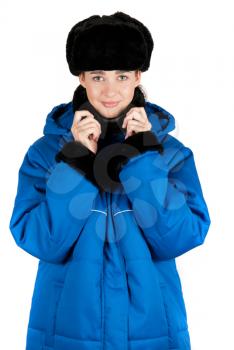 Royalty Free Photo of a Woman Wearing a Hat and Jacket
