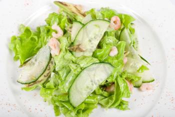 Royalty Free Photo of a Shrimp Salad With Cucumber and Avocado