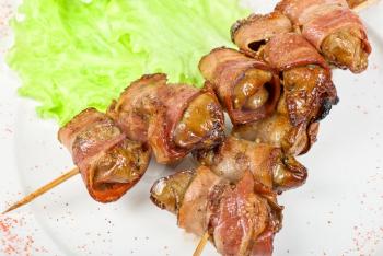 Royalty Free Photo of Chicken Kebabs Wrapped With Bacon