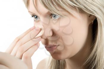 Royalty Free Photo of a Woman Applying Make-Up