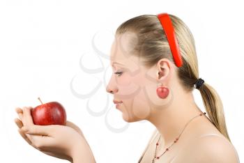 Royalty Free Photo of a Woman Holding an Apple