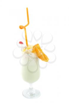 milk fruit cocktail with slice of orange cream and pipe