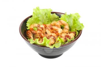 Deep-fried squid with salad leaves, sauce, green and lemon on a white background