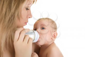 Royalty Free Photo of a Mother Feeding Her Baby