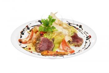 Royalty Free Photo of a Salad With Roast Beef and Vegetables