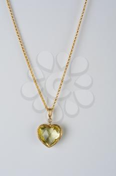 heart pendant of gold, diamond and lemon quartz