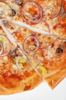 vegetable pizza closeup with tomato, Bulgarian pepper, onion, olive, champignons and mozzarella cheese