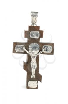 silver and wooden cross with religious inscriptions isolated on a white