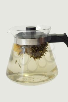 A glass teapot with Lotus Flower Chinese tea