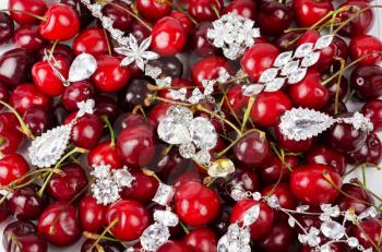 Jewels at fruit red ripe cherries berry background