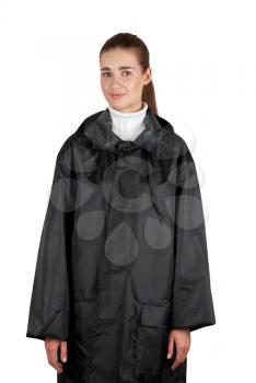 woman in rain coat on a white