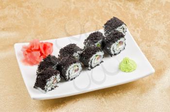 sushi roll with tuna, avacado, sauce and flying fish roe