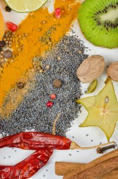 Colorful spices on a white background - beautiful kitchen image.