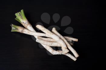 horseradish close-up on black background