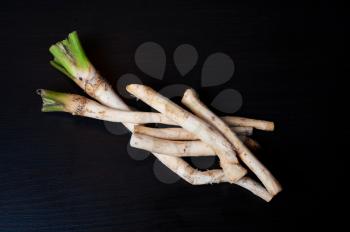 horseradish close-up on black background