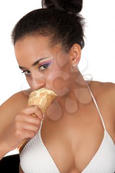 Portrait of sexy young beautiful woman eating sweet ice-cream on a white