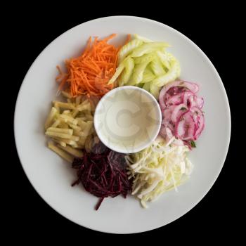Cutted fresh vegetables on a plate