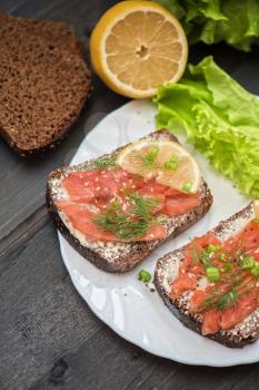 Sandwiches with salmon fish for breakfast