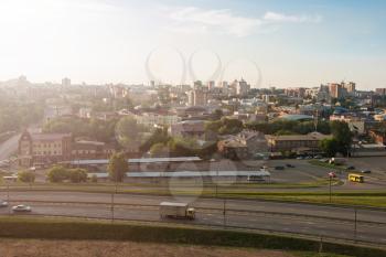 Panoramic picture of road and cars driving, summer sunny day in Barnaul, Siberia, Russia