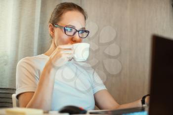 Coronavirus concept. Woman in quarantine for coronavirus working from home