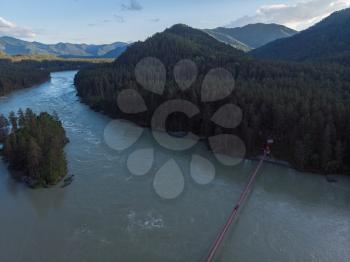 Aerial view of Katun river with bridge, in Altai mountains
