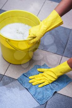 Cleaning concept. Closeup photo of woman cleaning at the home