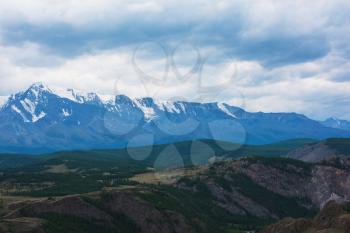 Summer in Kurai steppe and North-Chui ridge of Altai mountains, Russia. Cloud day.
