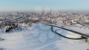 Barnaul, Siberia, Russia- January 13, 2019: Aerial shot of main view to Barnaul city, Siberia, Russia. Winter sunny day on on January 13, 2019 in Barnaul, Russia