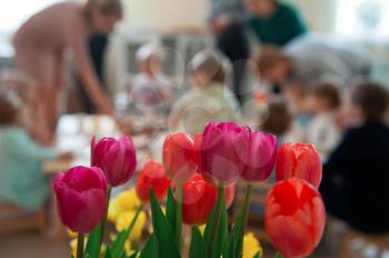 Concept of spring holiday, womens day or mothers day in montessori school for the learning of children