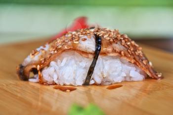 sushi unagi with sauced slice of smoked eel