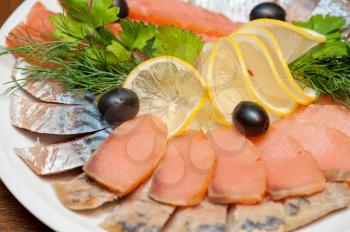 The set marinated mackerel, herring fillet, and salmon