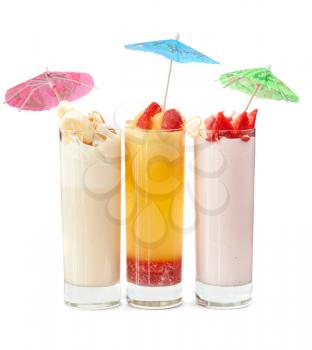 Set of three healthy nonalcoholic cocktails from berries banana and ice cream