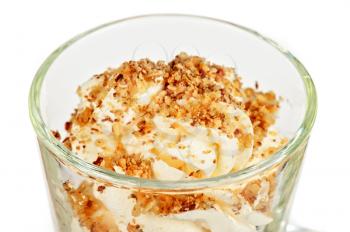 Vanilla ice cream in bowl with nuts  on white background