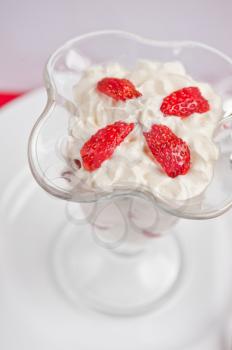 strawberry with cream closeup photo