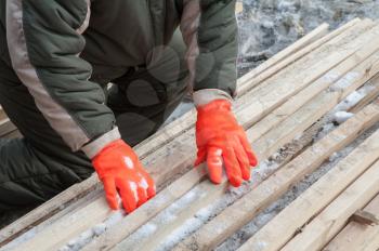 Carpenter working at sawmill, closeup photo